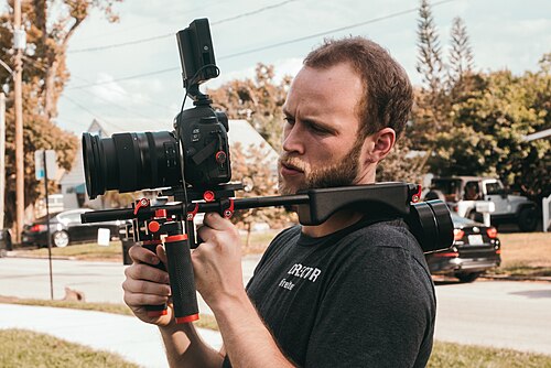 Freelance video dual-job pattern — Austin